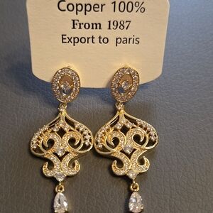 Elegant Gold and Silver Dangle Earrings